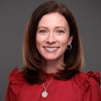Kelley Morse, Chief People Officer at Bullhorn seen posing for a photo with a bright smile on her face